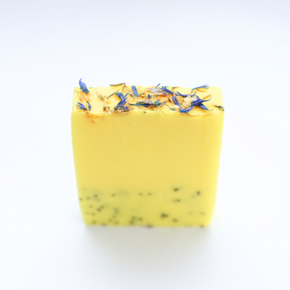 Lemon poppy soap has beautiful dried flowers on top of the soap