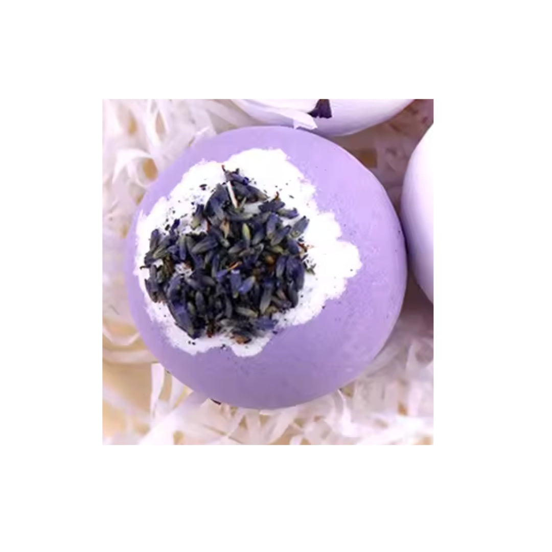 Photo of a lavender bath bomb with lavender buds in the centre of the bath bomb