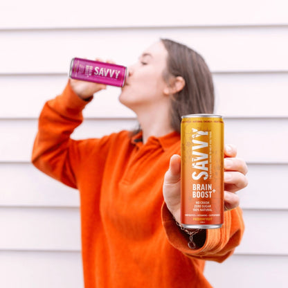 Image of a girl drinking brain boost best nootropics drink with vitamins ashwagandha vitamin c and b and caffeine